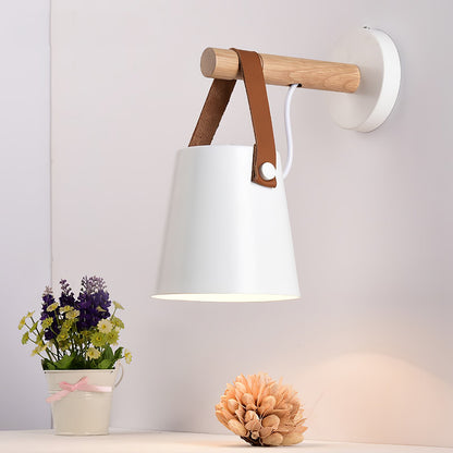 Conical wall lamp made of wood