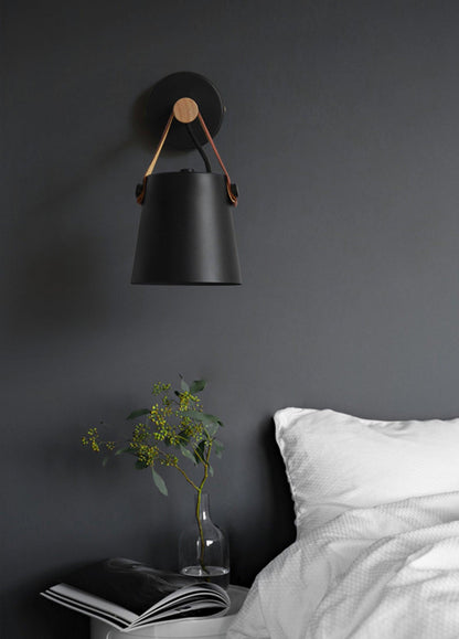 Conical wall lamp made of wood