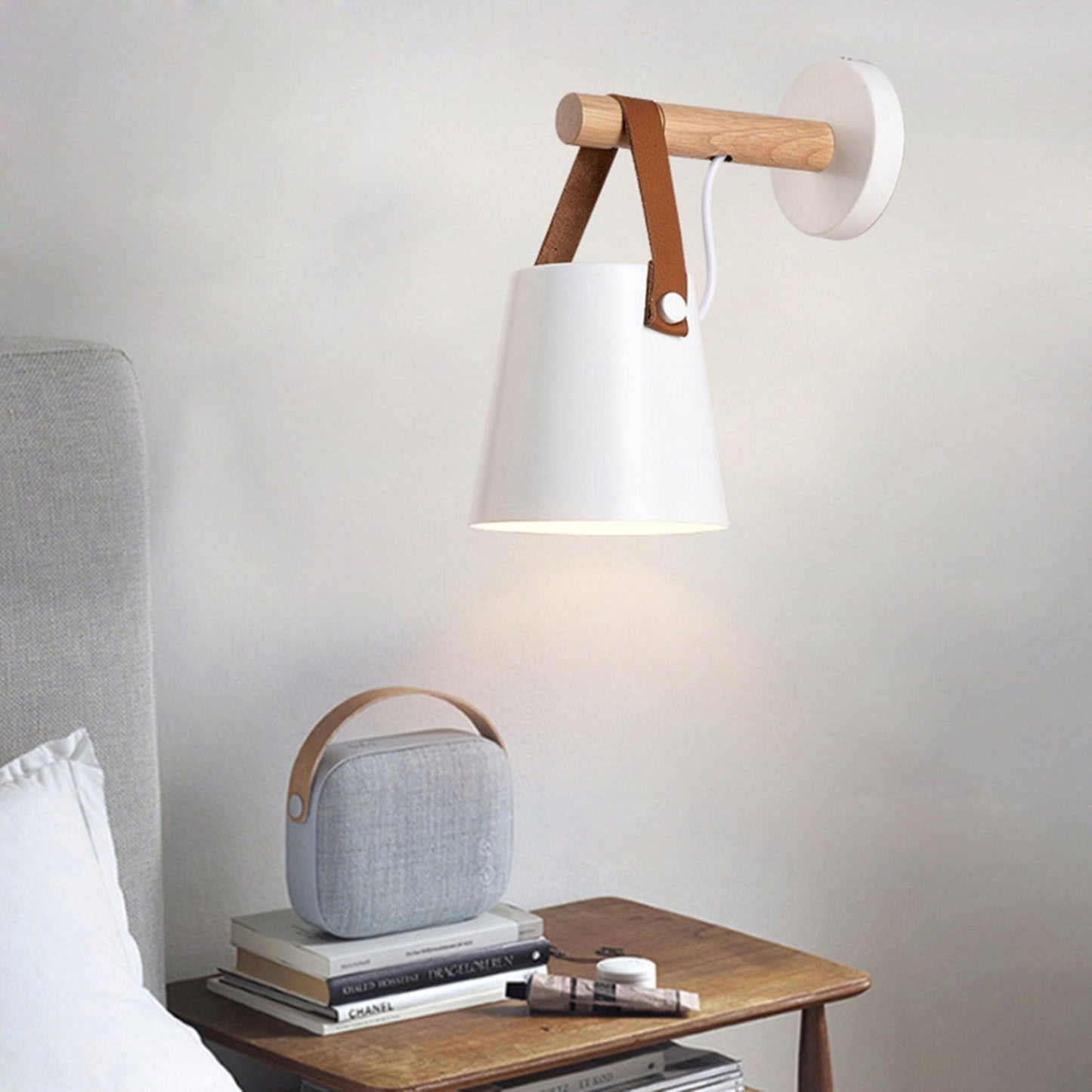 Conical wall lamp made of wood